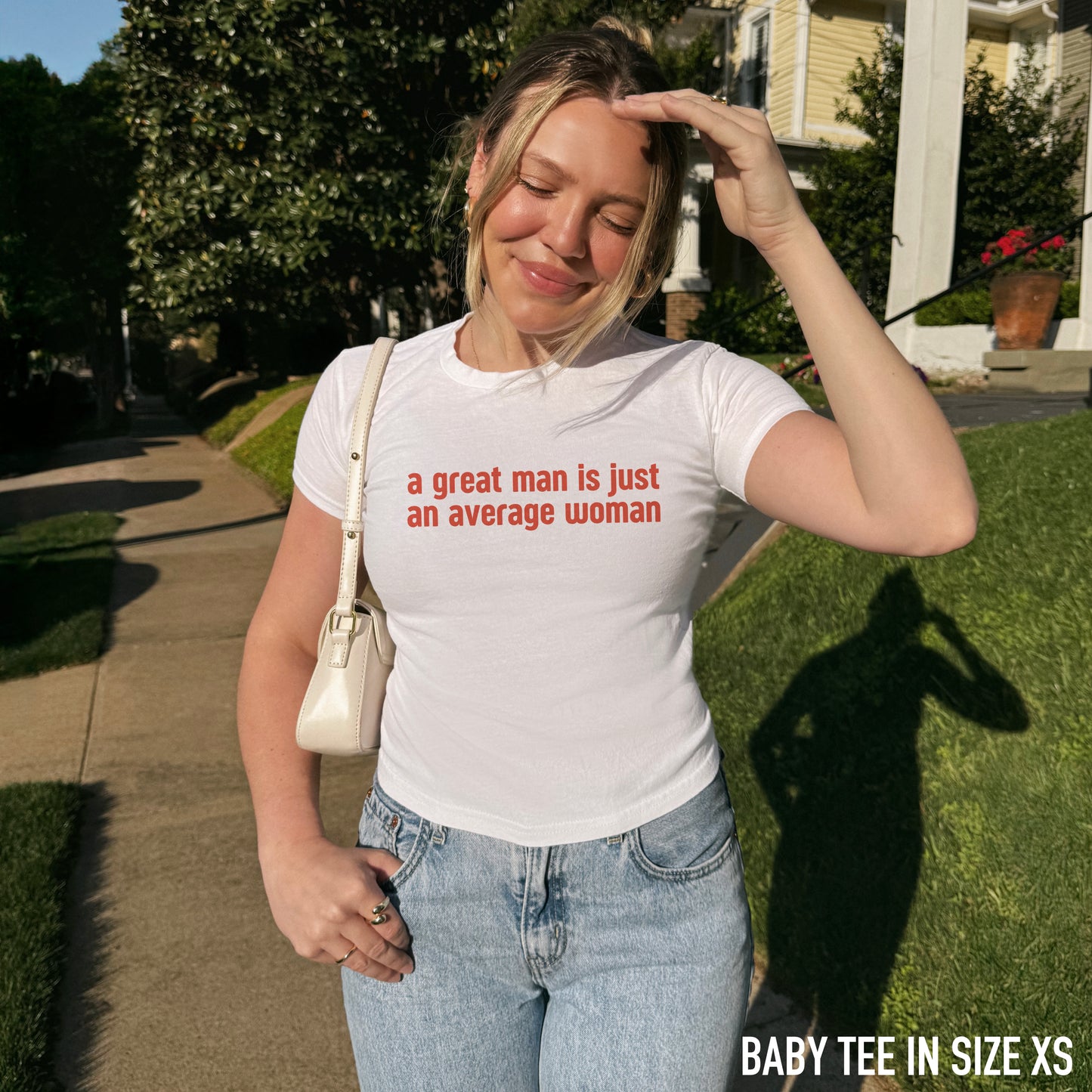 A Great Man Is Just Average Woman Baby Tee